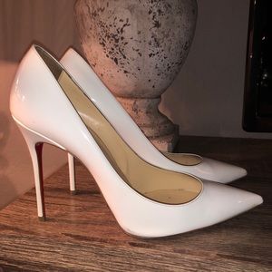 White Christian Louboutin heels